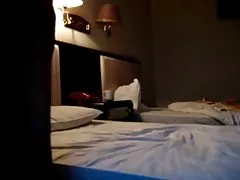 Casal amador chinês no hotel